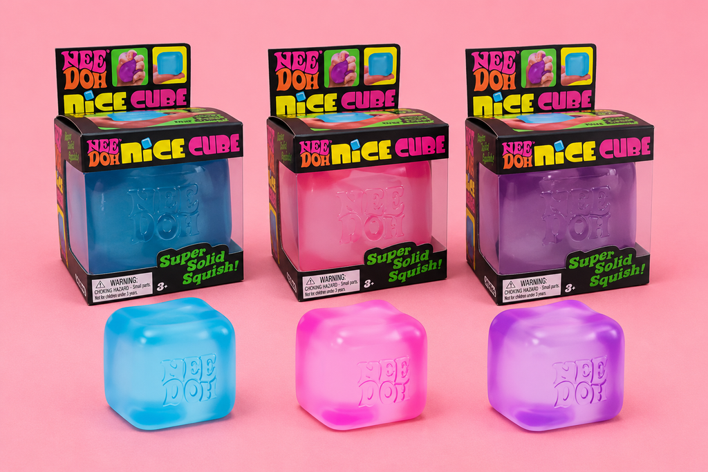 Pastel NeeDoh squishy cubes in blue pink and purple on pink background