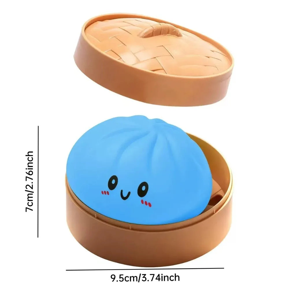 Blue squishy dumpling sensory toy on pink background