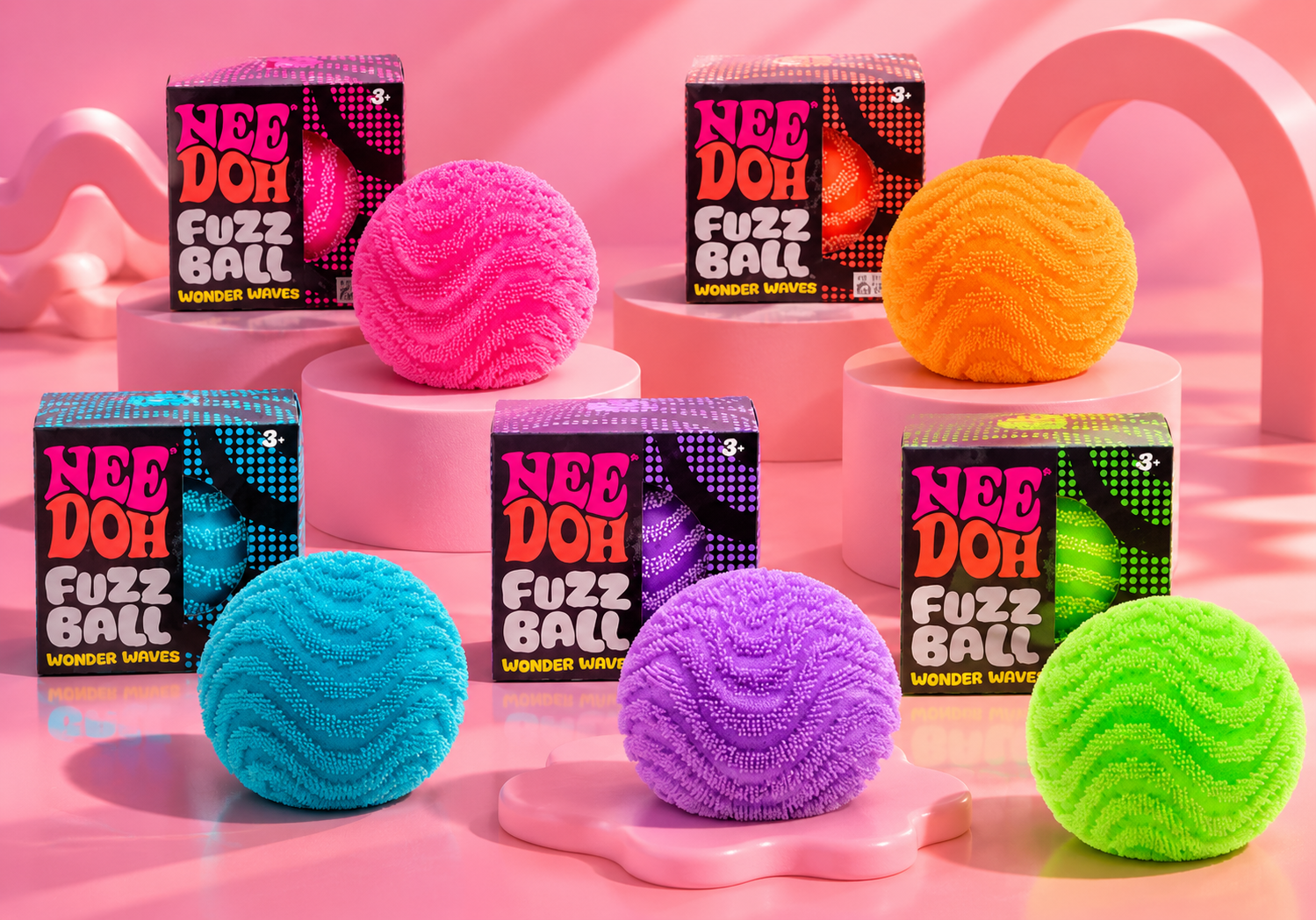 Colorful NeeDoh Fuzz Ball sensory toys collection on clean studio background